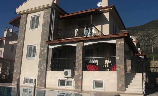 <p>The 3 floors fully airconditioned Oriana villa in Ovacik with nice mountain views. It consists of 2 double bedrooms with en-suite bathrooms, 2 twin rooms, 1 single room and 2 further bathrooms. The Villa Oriana G is suitable for up to 9 people.</p>
