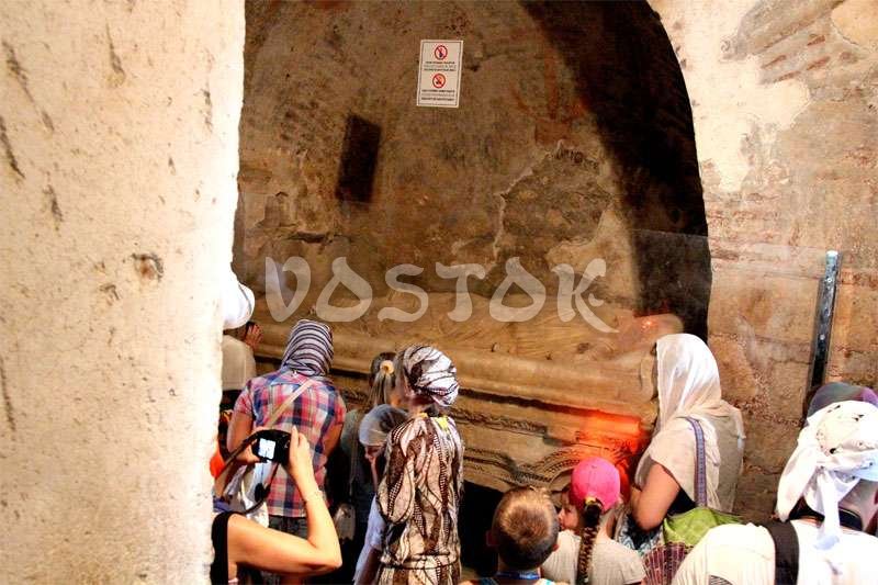 People queue to pray near the original tomb of Saint Nicholas - Guided tour from Oludeniz Hisaronu Fethiye to Kas Kalkan Myra Kekova