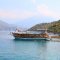 Regular double decker boat is anchored at Saint Nicholas Island - Oludeniz Boat Trips