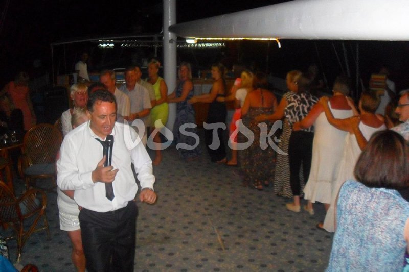 Sing a song and dance a dance during sunset cruise from Fethiye