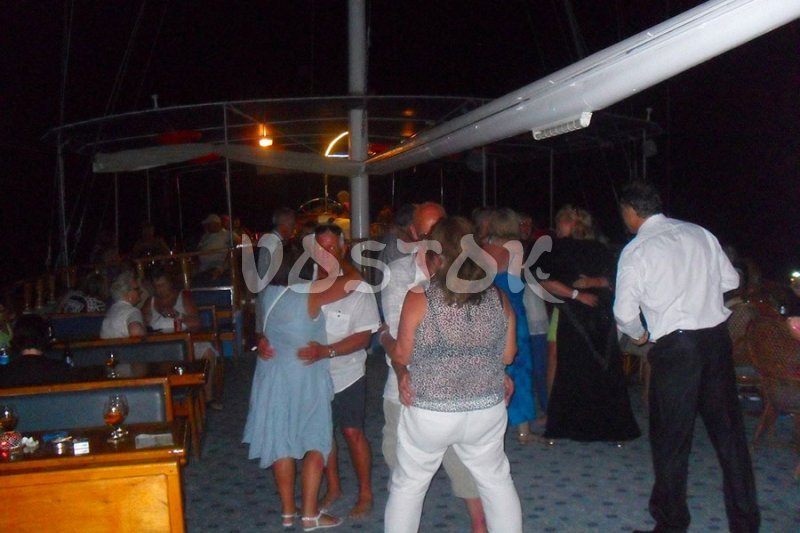 Dancing on the deck during the sunset cruise from Fethiye Turkey