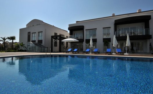 <p>The Odyssey Residence is in a perfect location just 200 m from the sea about 4 km from the Calis area of Fethiye on the coast of Turkey. Designed and constructed with 5 Star standards, this friendly luxury boutique Odyssey apartment complex is ideal for couples and families with a wide range of shops and restaurants just steps away, and 29 attractive standard, superior and deluxe suites overlooking a sparking swimming pool, the beautiful garden, or the azure Sea.</p>
